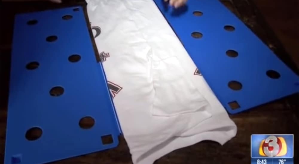 Folding a t-shirt on the flip-n-fold