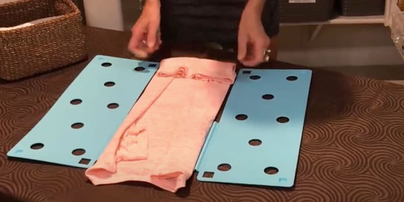 Fold the bottom portion of the shirt up so it is flush with the bottom of the FlipFold.